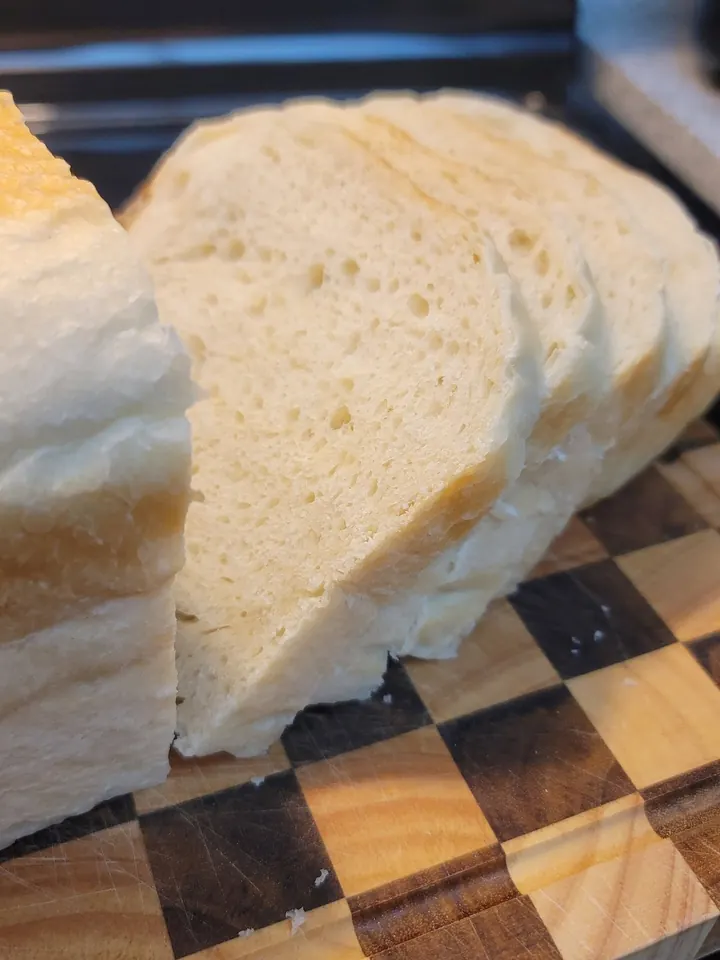 Slices of soft sourdough sandwich bread